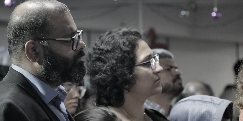 Families worshipping together at Family Connect NLF City Church
